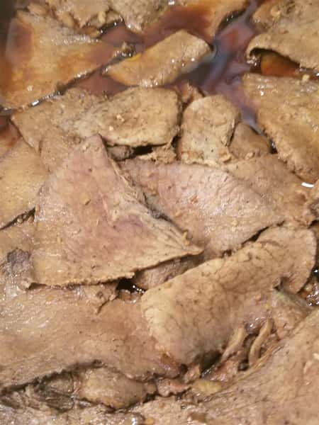 cut up fresh meat in a serving tray