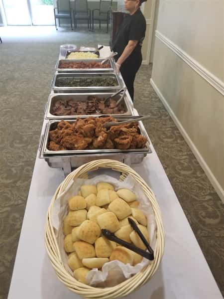 An assortment of food trays on a table
