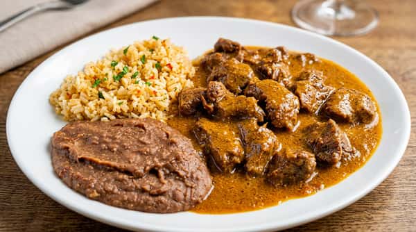 Carne Guisada plate