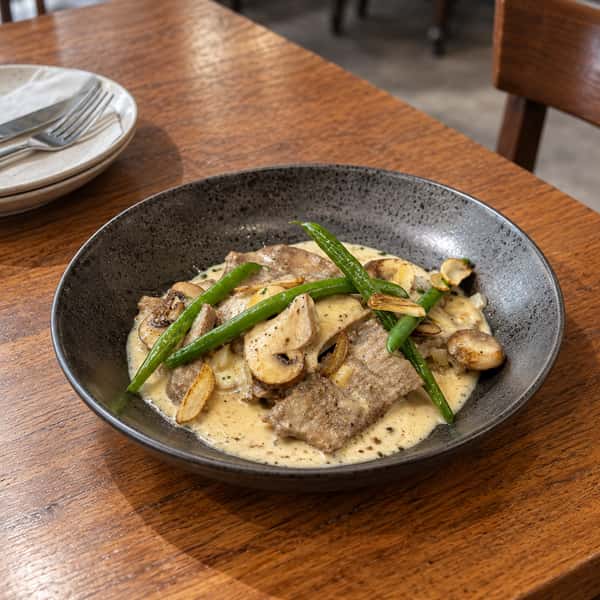 Lengua con Champignon