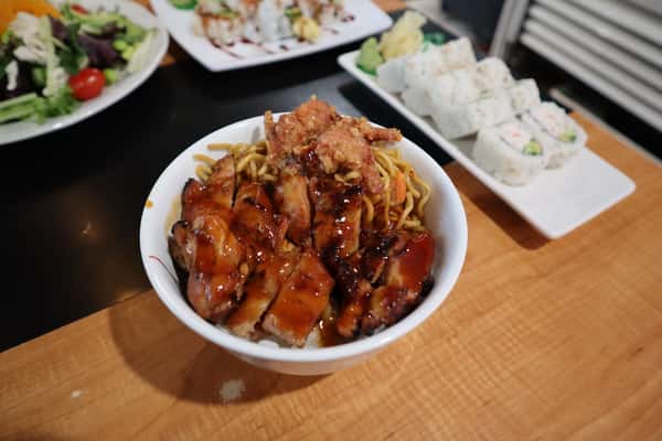 Noodle and rice bowl with teriyaki chicken.