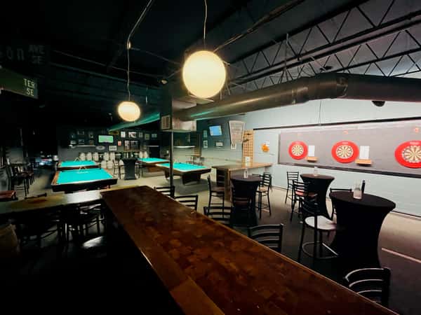 Pool Room. 4 Tables and Darts. High-tops available.