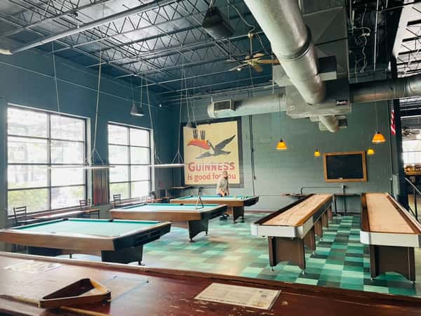 Pool and shuffleboard tables.