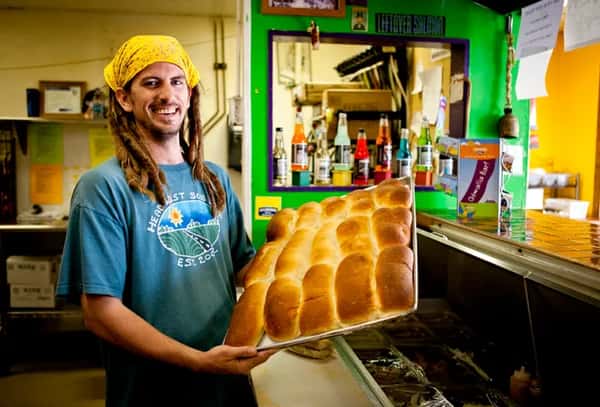 baker and freshly baked goods