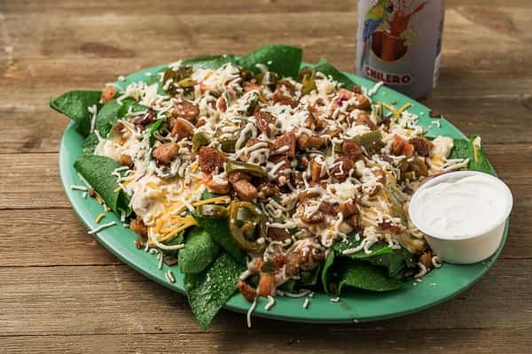 Chicken, cheese and peppers on a bed of spinach