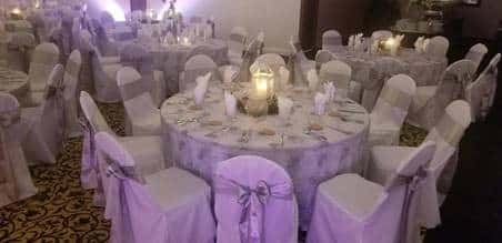 Reception guest table with purple accents
