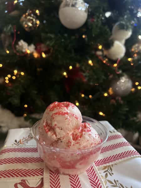 Ice cream and a christmas tree behind it
