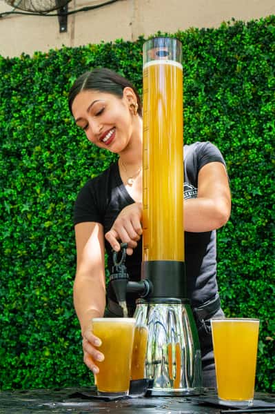 Beer towers at On The Kirb: Organic Eatery & Sports Bar
