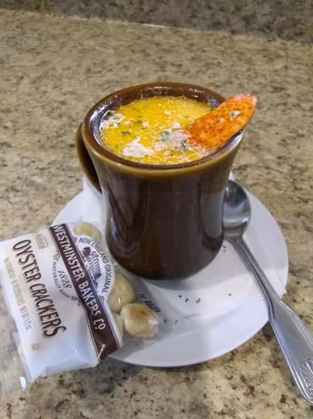 soup in cup with oyster crackers