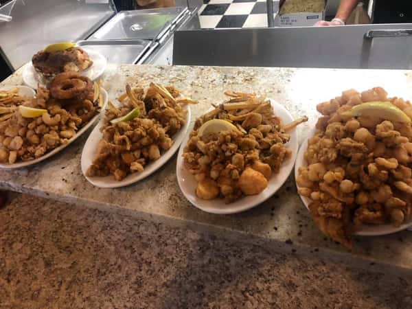 several trays of fried clams