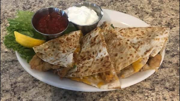 Haddock Quesadilla with salsa and sour cream sides
