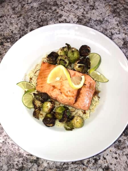 Maple brown sugar salmon with balsamic Brussels sprouts over rice
