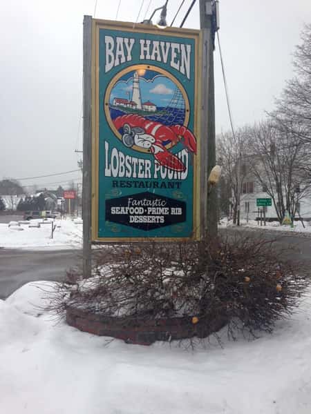 outside signage to bay haven lobster pound near the road