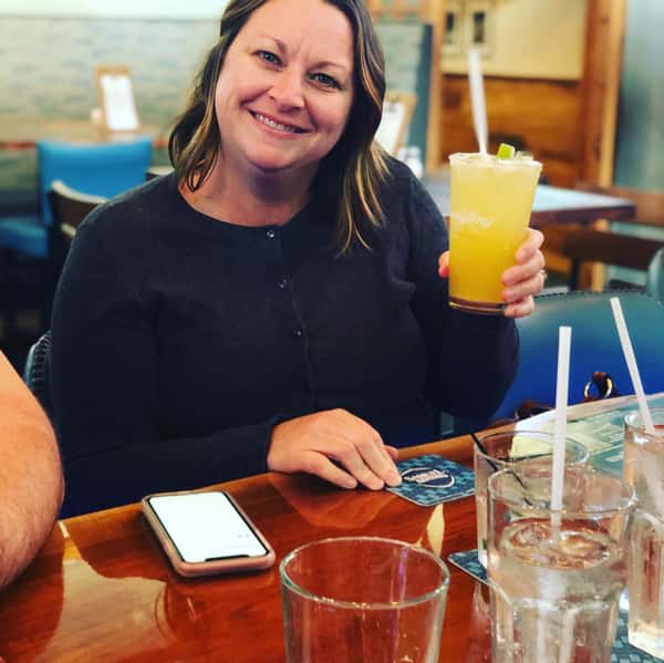 woman posing with cocktail