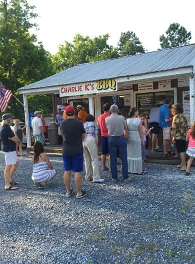 people waiting in line to order from charlie k's bbq