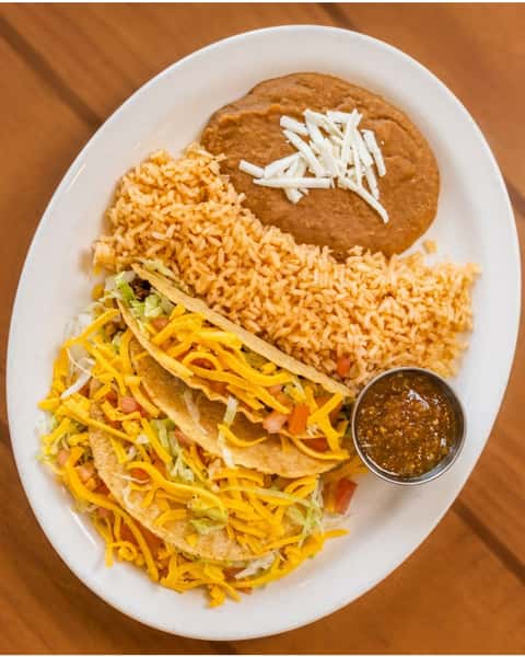 Three crispy beef tacos, lettuce, tomato, cheddar, rice, and refried beans — the Crispy Beef Taco Plate is a classic worth repeating. Order ahead, skip the wait. 🌮🧡
 
#Moderno #CrispyBeefTacoPlate #WestHouston