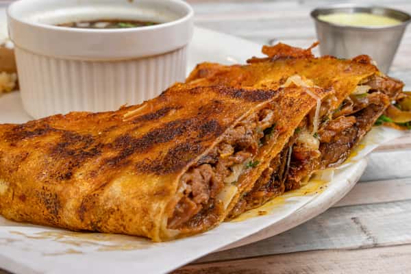 Quesa Brisket Birria Tacos