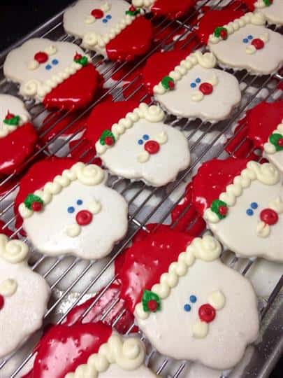 Covered cookies in the shape and colors of Santa