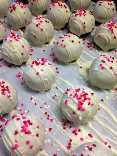 Fudge covered with white chocolate and red decoration