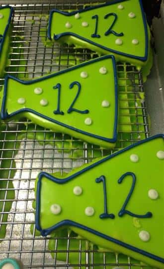 Light green covered cookies with dark green letters