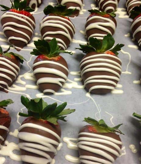 Strawberries covered with dark and white chocolate