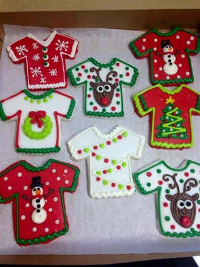 Covered cookies in t-shirt shape with christmas decoration