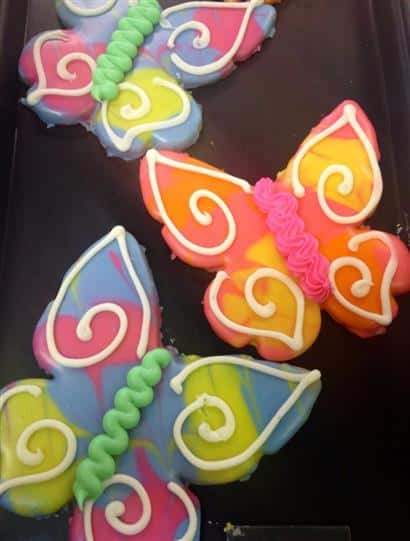 Colorful covered cookies in butterfly shape
