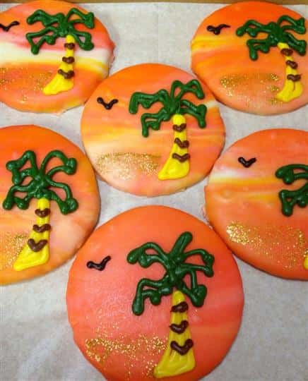 Covered orange decorated with a coconut trea on an island