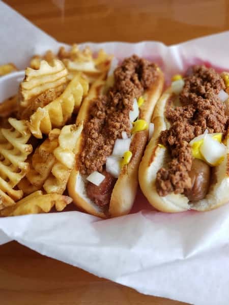 Mince and hotdog with a side of fries