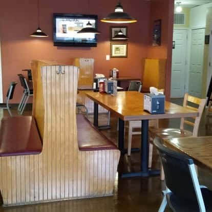 Restaurant interior with booths and seats