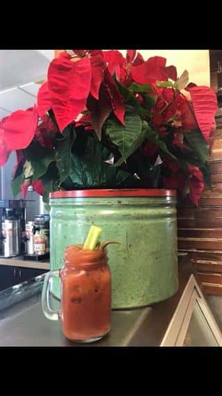 bloody mary drink being displayed on a counter