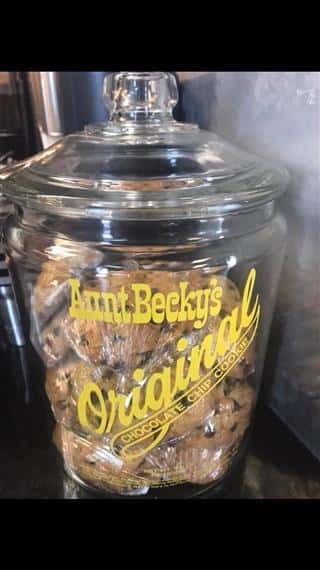 aunt becky's original chocolate chip cookies in a large glass jar