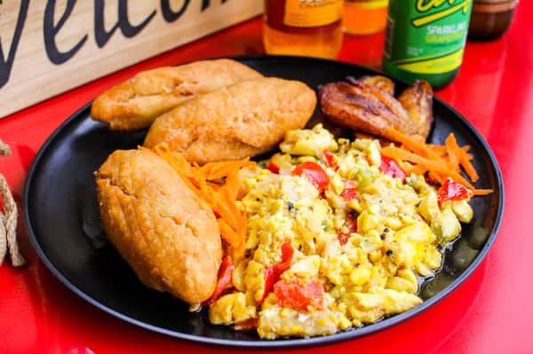 Savory plate with fried dumplings, scrambled eggs, and vegetable