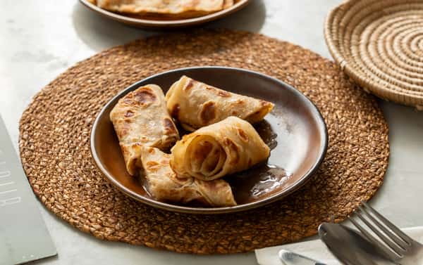 Sabayad topped with clotted cream and honey