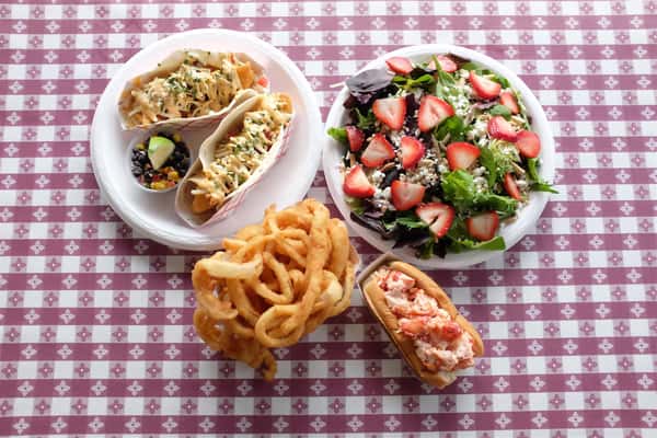 assortment of seafood dishes on a table