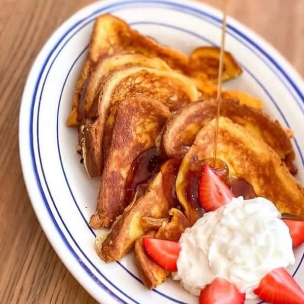 French Toast with whipped cream and strawberries