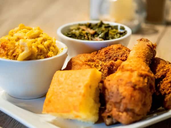 Leg and Thigh meal served with green beans and mac and cheese.