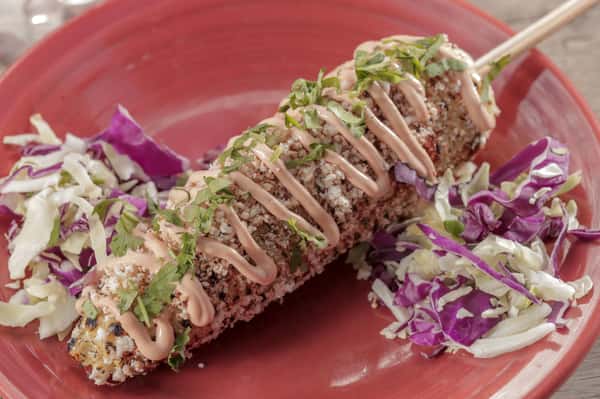 street corn, topped with chipotle crema, cotija cheese and cilantro.