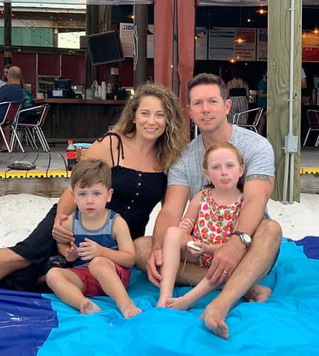 family attending Movies on the Beach event