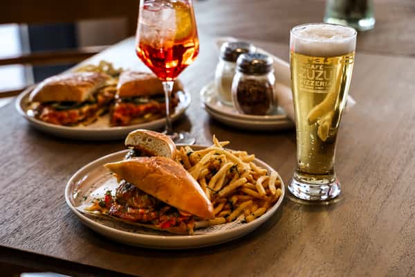 chicken parm sandwich & meatball sandwich & zuzu pilsner