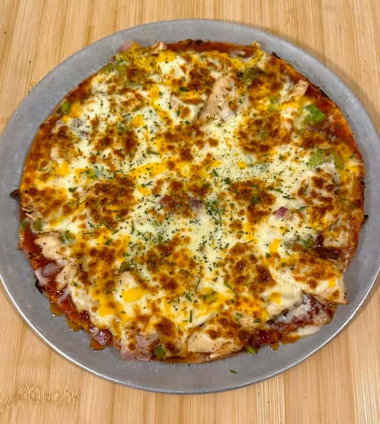 THAI CHILI CHICKEN PIZZA Weekly Features Casual Dining