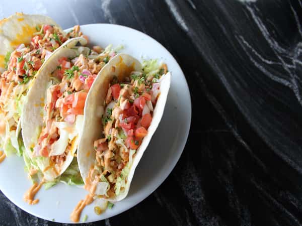 three chicken tacos