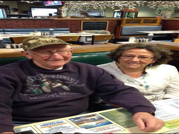 An older couple about to enjoy lunch