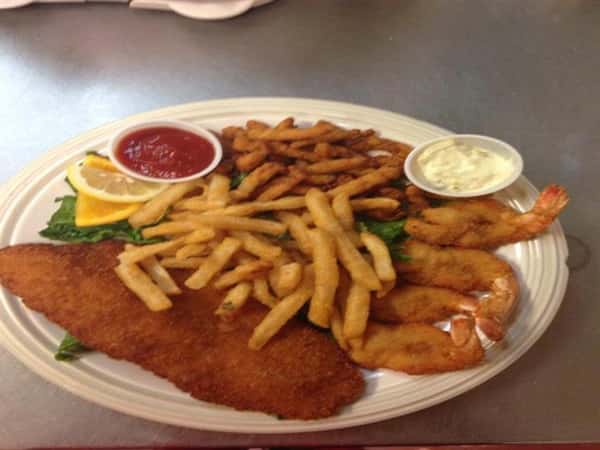 Seafood combination platter with One crab cake, flounder, clams, shrimp.