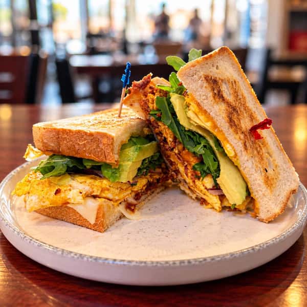 Saturday morning at The Corner Store: a hearty chorizo breakfast sandwich and live music from the Feter Martin Homer Band. 🎶
Made with three eggs, chorizo, mayo, provolone, mixed greens, and avocado. Come by for breakfast and enjoy the music! 🍳🥑☕