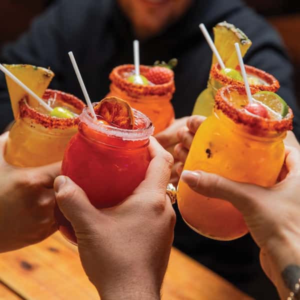 toasting with cocktails