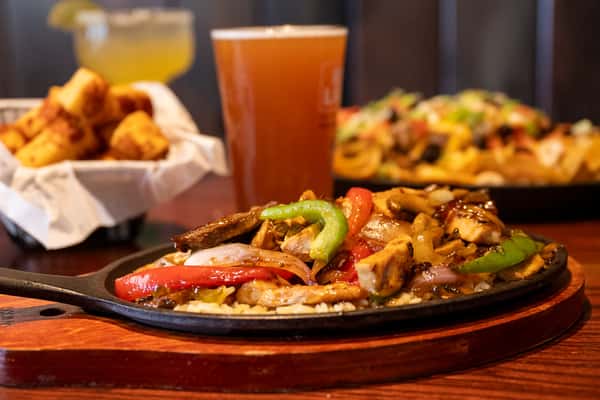 Bourbon Chicken Skillet, Nachos, Beer, Cheese Curds, and a Margarita