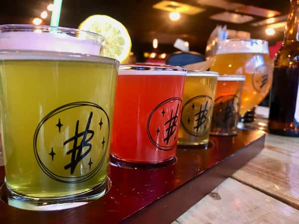 A flight of Voodoo beers kicked off by the Lacto-Kooler green and red variants.