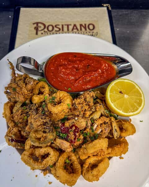 Crispy fried calamari with marinara sauce and lemon served at Positano Ristorante Italiano