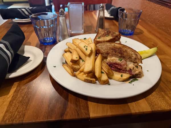 Grilled sandwich with seasoned fries served at Positano Ristorante Italiano in Palm Harbor